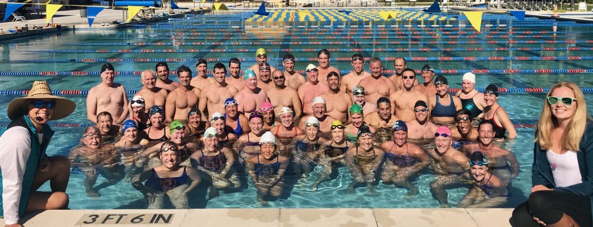 More than fifty Palm Beach Masters swimmers gathered on the pool deck for a team photo