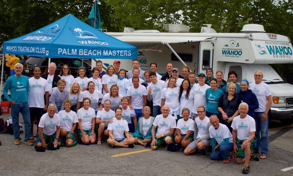 The Palm Beach Masters national team beside the Wahoo Wagon